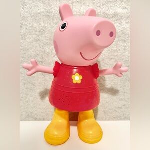Hasbro Peppa Pig Peppa's Muddy Puddles Party interactive doll.
